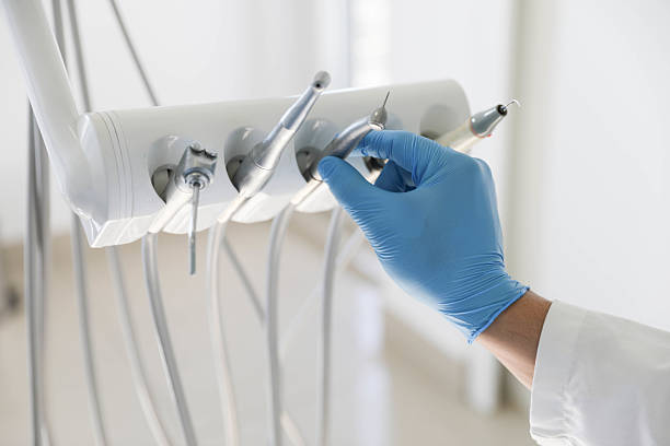 Professional Tooth Extraction technician working in Orange County County, CA